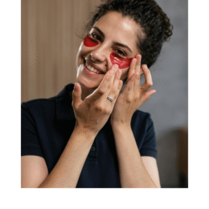 Woman gently treating puffy eyes with skincare routine for better eye health